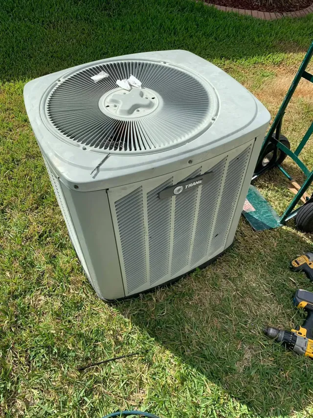 Easy All AC Repair technician checking an AC system in Coronado, CA